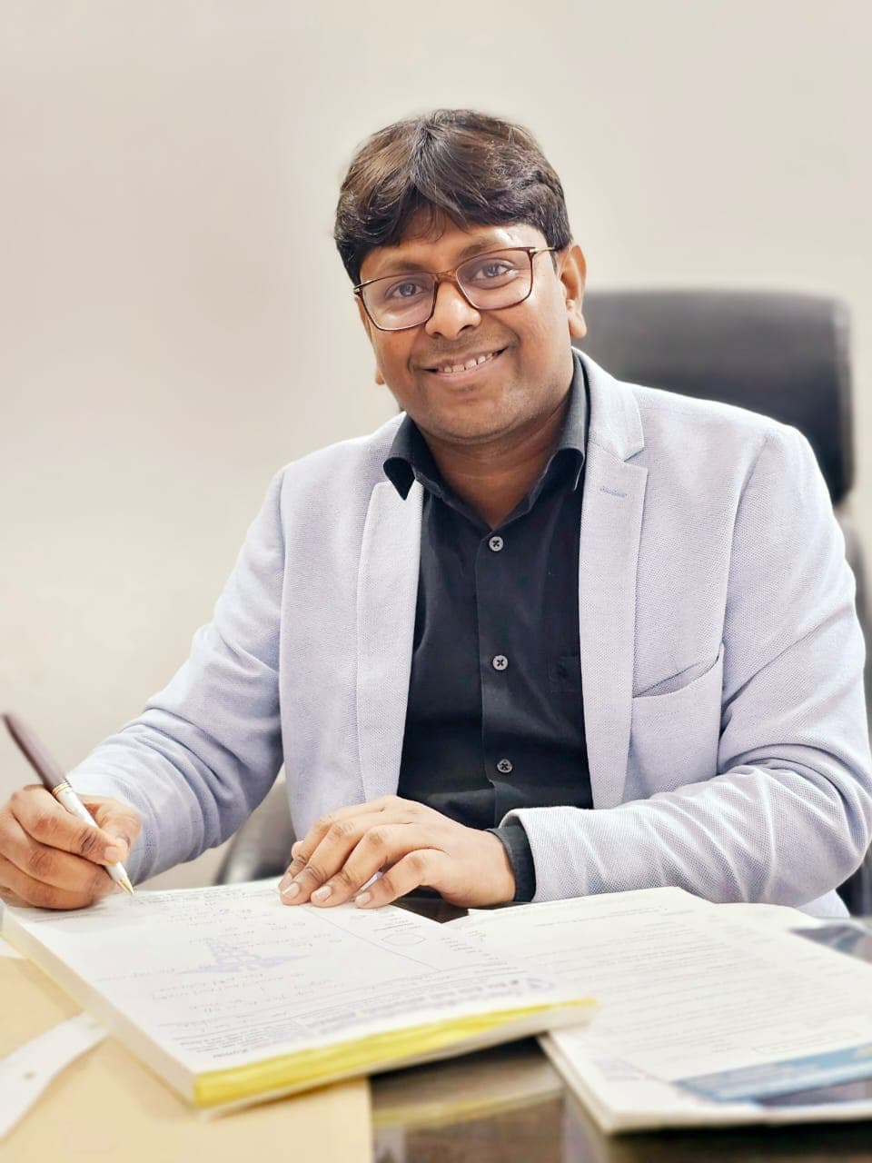 Dr. Shrawan Kumar